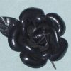 Fleur noire cuir ciré