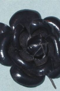 Fleur noire cuir ciré